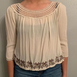 Me to We cream, embroidered, open-back blouse